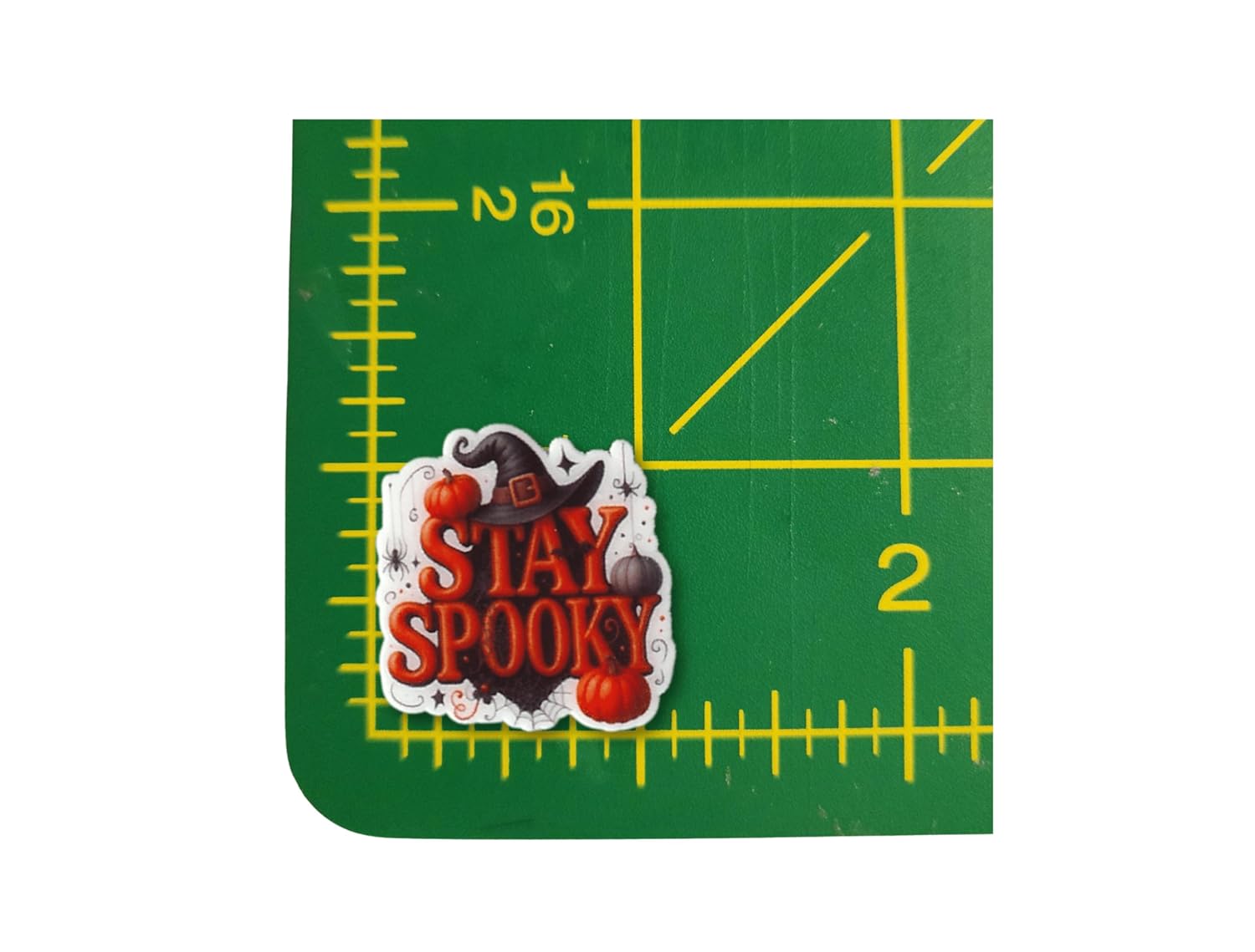 Stay Spooky magnetic needle minder with witch hat, pumpkins, and spider