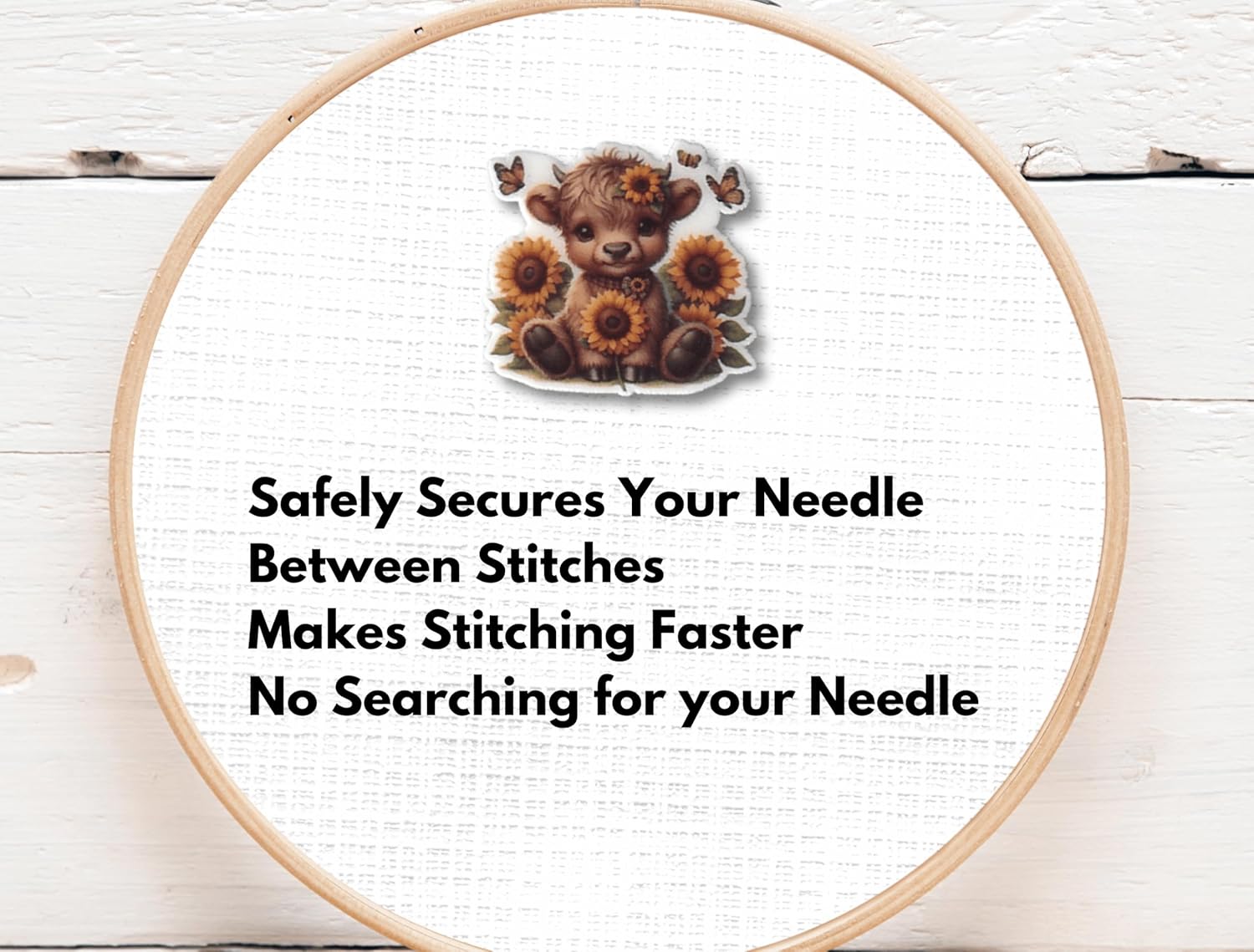 Sweet baby Highland cow needle minder with sunflower crown and butterflies