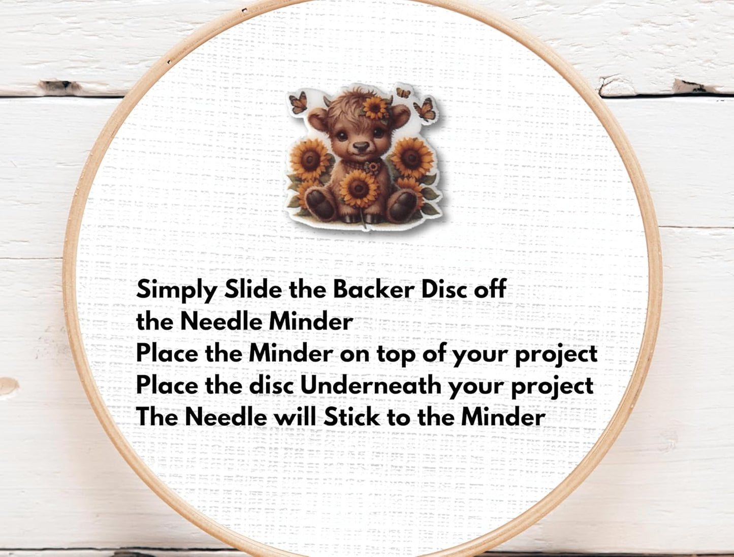 Sweet baby Highland cow needle minder with sunflower crown and butterflies