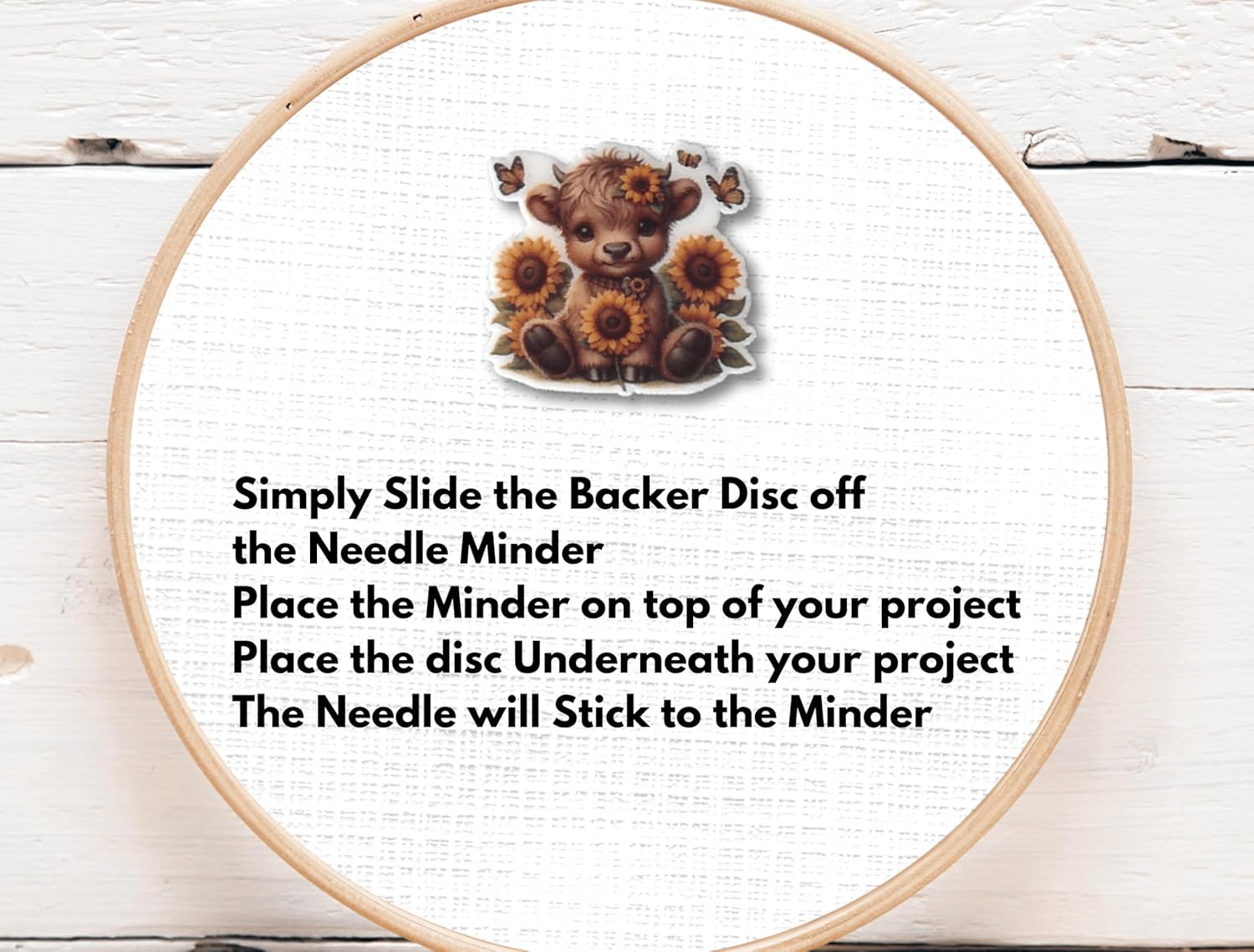 Sweet baby Highland cow needle minder with sunflower crown and butterflies