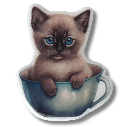Blue eyed kitten sitting in teacup magnetic needle minder for cross stitch
