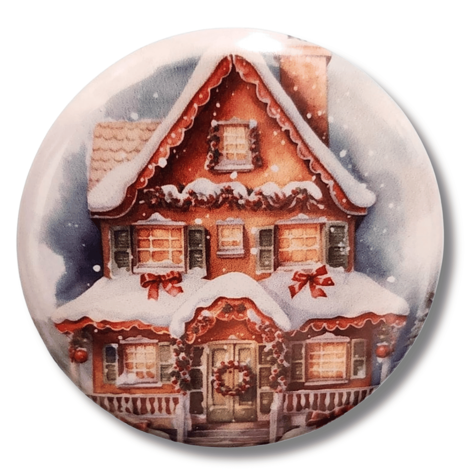 Snow-covered gingerbread house magnetic needle minder with glowing windows and festive red bows