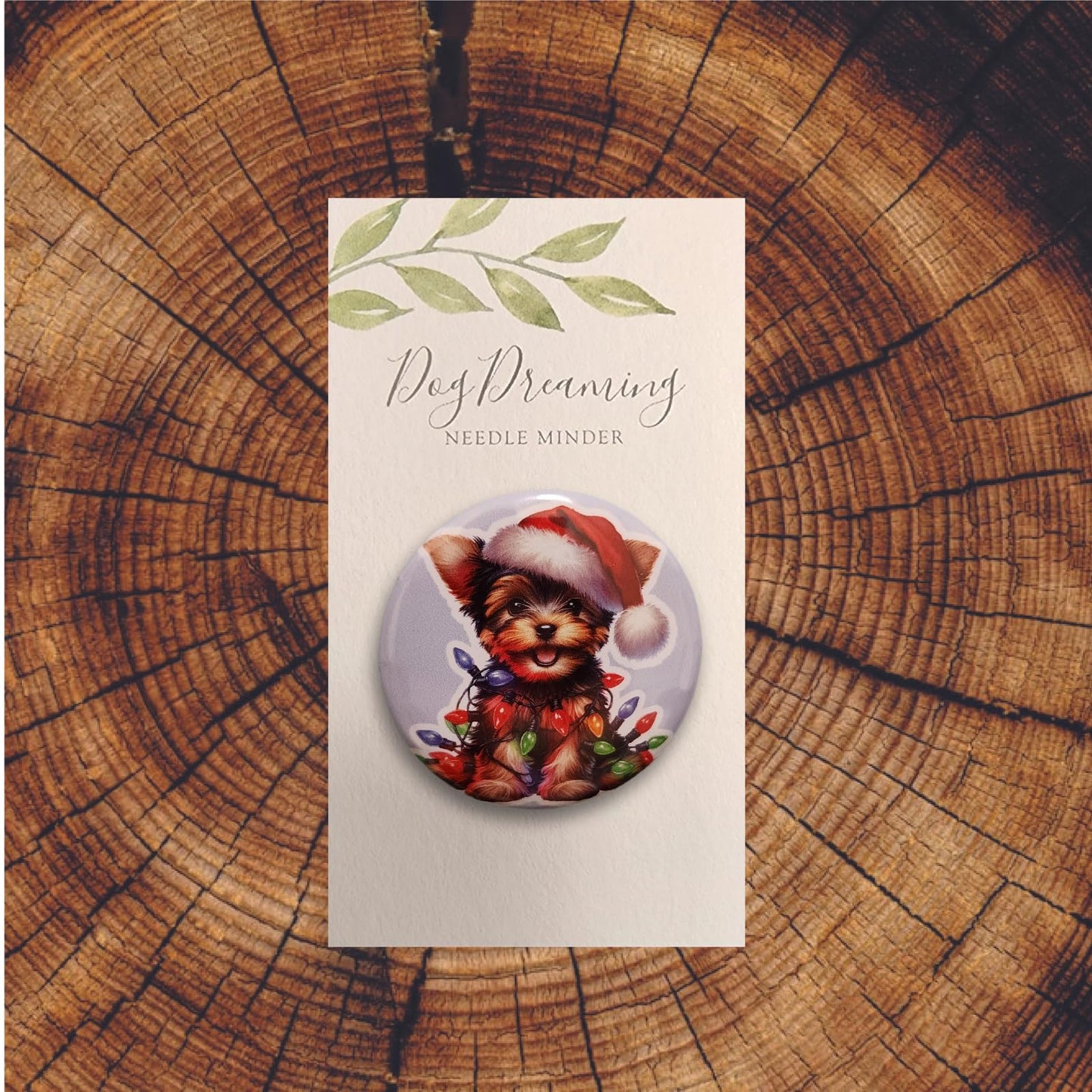 Yorkshire Terrier Christmas magnetic needle holder with Santa hat and festive light strand detail