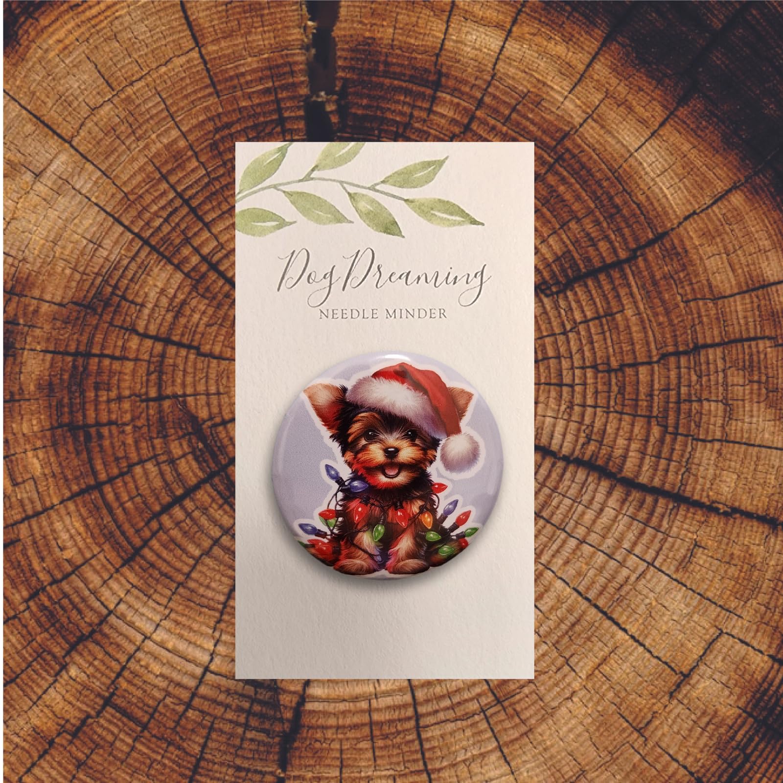 Yorkshire Terrier Christmas magnetic needle holder with Santa hat and festive light strand detail