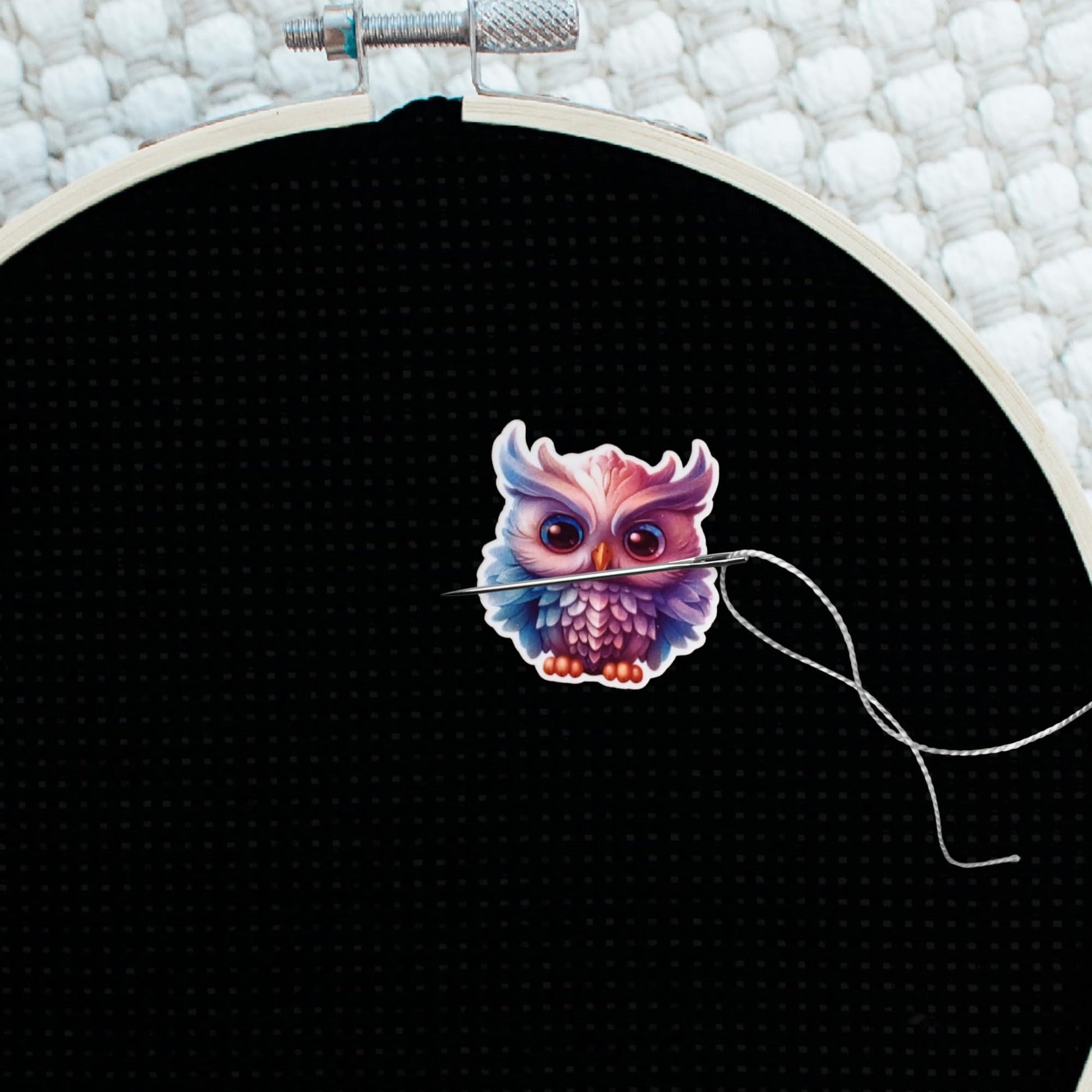 Adorable owl sewing accessory with layered feather details