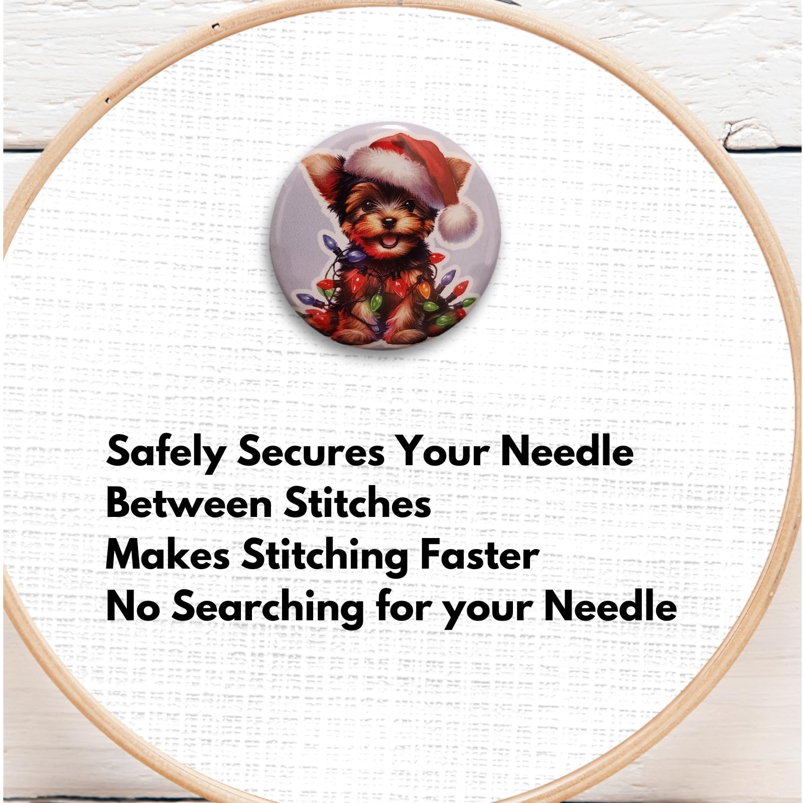 Festive Yorkshire Terrier needle holder with bright red, green, and blue Christmas bulbs for cross stitch projects